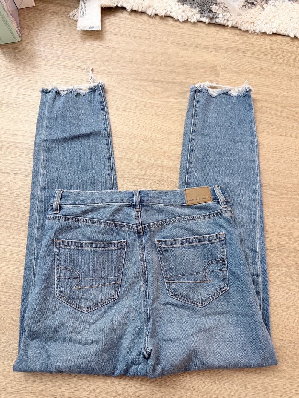 American Eagle High-Rise Light Wash Frayed Hem Jeans - Picture 2 of 7